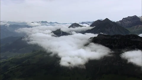 Aerial of mountains covered with clouds, Over Ridges And Clouds Stock Footage 108612302