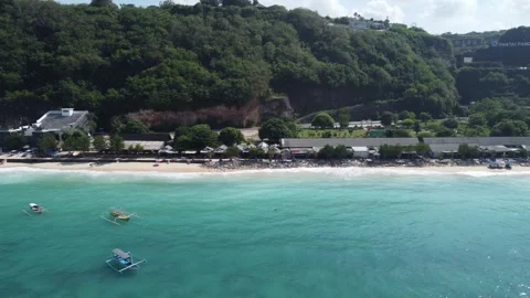 Aerial move along left side of Pandawa Beach Stock Footage 329187839