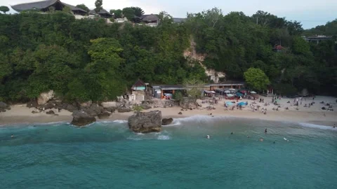 Aerial move from beach to cliffs at cloudy sunset Vídeo Stock 329139134