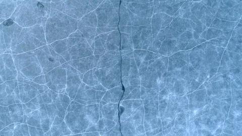 Aerial Move Down on Lake Ice Pattern Video stock 92003176