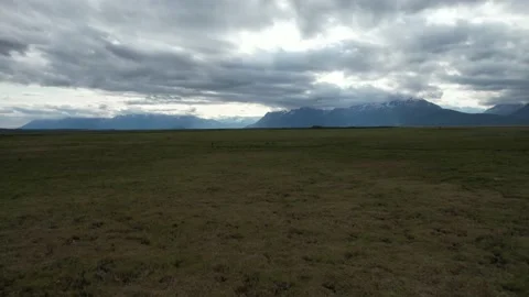 Aerial Move Forward With View of Alaska Wilderness Under Dramatic Cloudy Sky Vídeo Stock 170165680