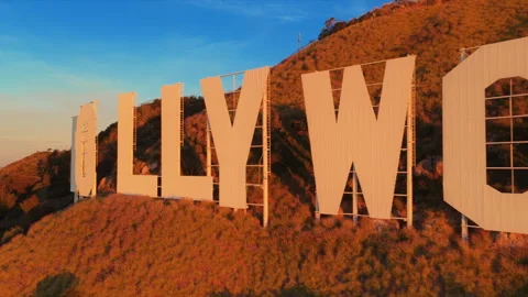 Aerial Move from Front to Side of Hollywood Sign at Sunrise Los Angeles Video stock 342580578
