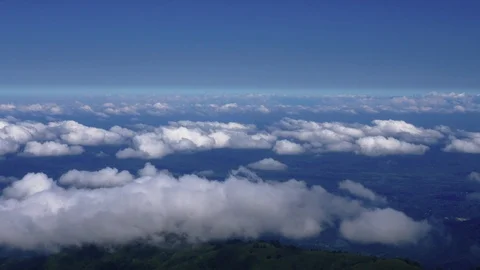 Aerial: Moving clouds, view from the top of the mountain Stock Footage 115076111