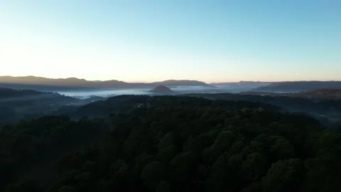 Aerial Moving Forward Over Valley With Low Morning Fog And Clear Sky Above 스톡 동영상 233457723
