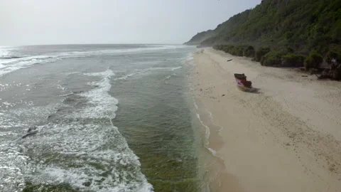Aerial Moving Forward Over Waves Washing Ashore On A Tropical Island Beach, With Stock Footage 154564383