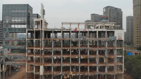 Aerial moving forward view of a demolition site Stock Footage 125649758