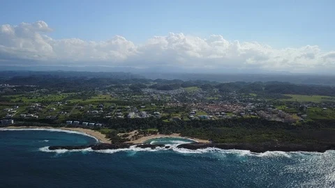 Aerial Moving Into Secluded Beach Shaped By Unique Rock Formation Stock-Footage 101641405