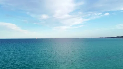 Aerial moving time lapse, clouds in motion over the ocean Stock Footage 121121565