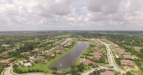 Aerial with Multiple Angles and Unique Camera Motions of Suburban Neighborhoo Stock Footage 55700042