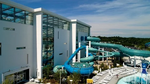Aerial Nashville Gaylord Opryland Water Park Slides Flyover to Parking Lot Stock Footage