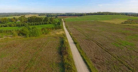 Aerial nature landscape fields lakes forests houses cottages Stock Footage