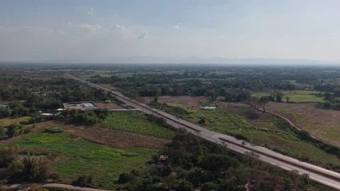 Aerial Nature Landscape with Fields Trees and Country Road Stock Footage 328688499