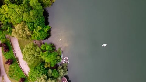 Aerial nature top down at Weissensee Lake in Prenzlauerberg Berlin Germany Video stock 243816853