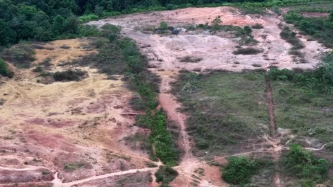 Aerial nature view of eroded soil patches and trails Stock Footage 332588588