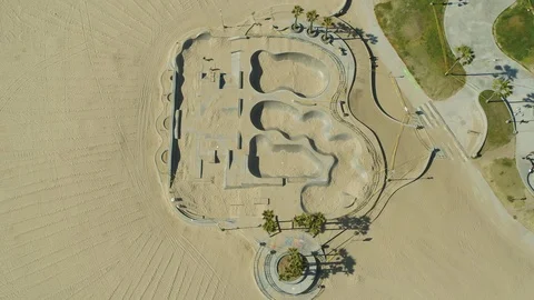 Aerial of nearly empty Venice beach skate park during corona quarantine USA 2020 Stock Footage 135360468