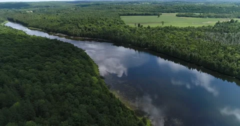 Aerial On Nice River And Forest Rural Vista With Soft Cloud Reflections In Water Stock Footage 237621622