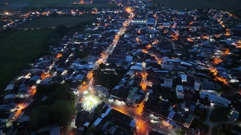 Aerial night drone view over tanjung piandang residential streets Stock Footage 333043427