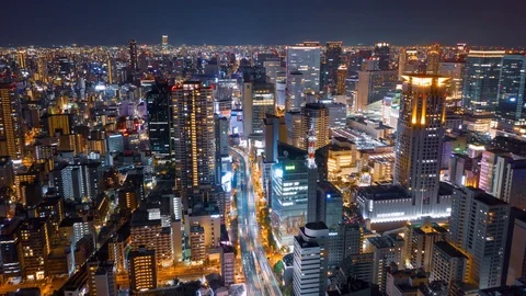 Aerial night hyper lapse over Osaka city with Umeda(Osaka) train station. Stock Footage 109089655