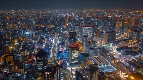 Aerial night hyper lapse over Osaka city with Umeda(Osaka) train station. Stock Footage 109101676