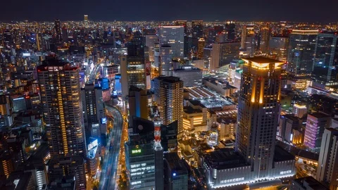 Aerial night hyper lapse over Osaka city with Umeda(Osaka) train station. Stock Footage 109101790