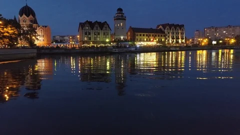 Aerial night illumination cityscape center Kaliningrad fish village Pregol river Stock Footage 127482229