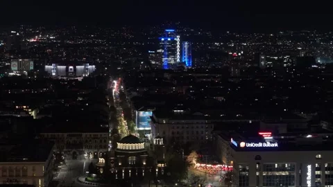 Aerial Night Panorama of Sofia Skyline Featuring the Blue Millennium Sofia Hotel Video stock 345002093