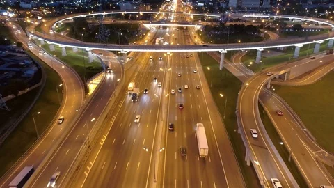 Aerial night road interchange junction active movement highway overpass Russia   Stock Footage 116267595