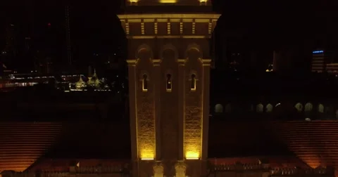 Aerial night shot of clock tower in Kuala Lumpur city, Malaysia Stock Footage 61550009