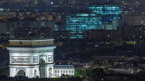 Aerial Night timelapse view of Paris City and Triumphal Arch shot on the top of Stock Footage 236918394