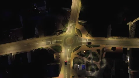 Aerial Night Top‑Down View of Illuminated Roundabout – 4K ProRes Stock Footage 337510627
