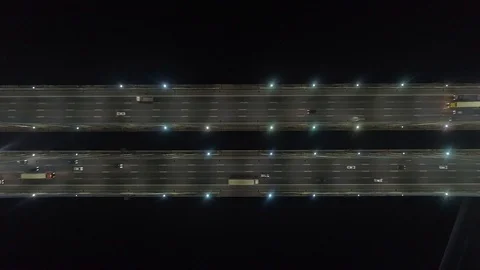 Aerial night traffic at bridge. Static shot Stock Footage 101698034