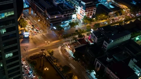 Aerial night traffic time lapse at an intersection in downtown Bangkok, Thailand Stock Footage 66420571