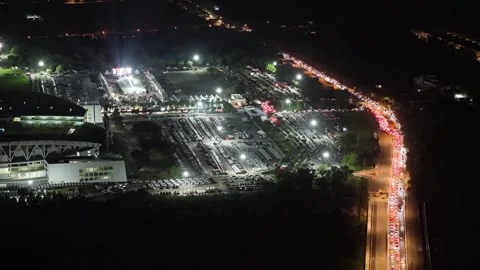 Aerial night view batu kawan modifighter festival parking and traffic Stock Footage 337535896