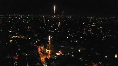 Aerial Night View Of Fireworks Exploding Over City Residential Area Vídeos de archivo 343914261