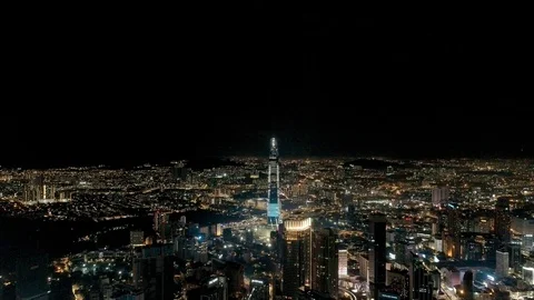 Aerial night view footage KLCC or Petronas Twin Tower at Kuala Lumpur, MALAYSIA. Stock Footage