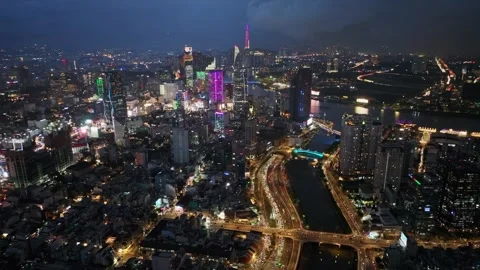 Aerial night view of Ho Chi Minh City along Vo Van Kiet Boulevard Stock Footage 340976104