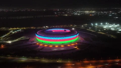 Aerial Night View of a Illuminated Stadium Exterior Stock Footage 341892005