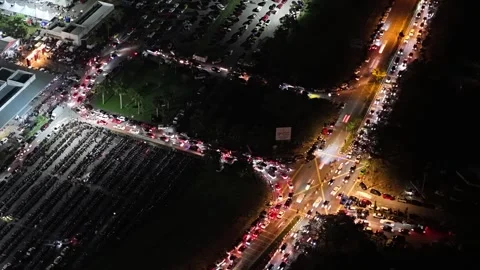 Aerial night view of intersection with vehicle light trails Видео 332604106