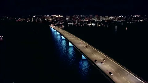 Aerial night view of John Ringling bridge in Sarasota Florida Stock Footage