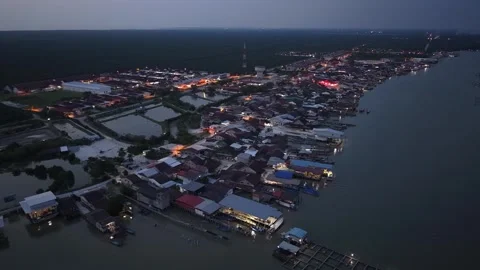 Aerial night view of Kuala Gula fishing village coastline Stock-Footage 337730402