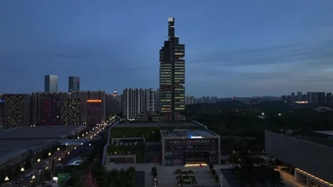 Aerial night view of landmark skyscaper in Guiyang City Guizhou China Stock Footage 307382553