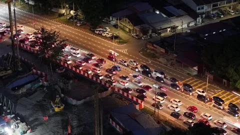 Aerial night view of light trails and traffic in George Town Видео 332094345