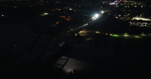 Aerial Night View of a Lit Bridge and City Lights in Austin Texas Stock Footage 328334595