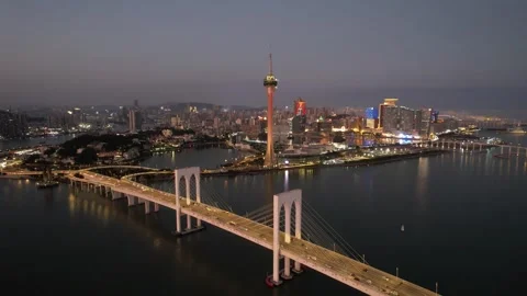 Aerial night view of the Macau Tower and Sai Van Bridge city scenery Stock Footage 346686870