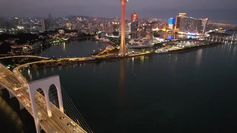 Aerial night view of the Macau Tower city skyline Stock Footage 346686874