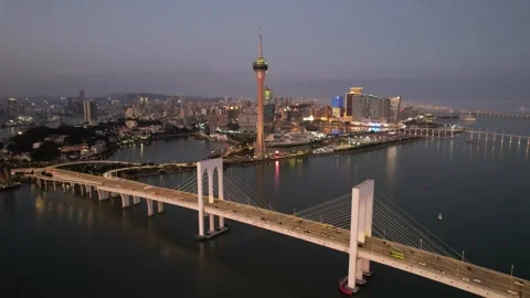 Aerial night view of the Macau Tower and Sai Van Bridge city scenery Stock Footage 346687222