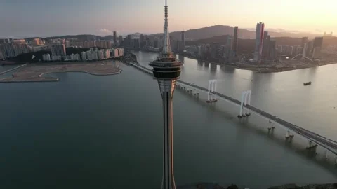 Aerial night view of the Macau Tower and Sai Van Bridge city scenery Stock Footage 346687613