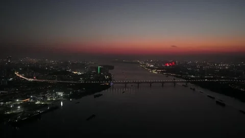 Aerial night view of Nanjing riverfront and illuminated bridges Stock Footage 340217342