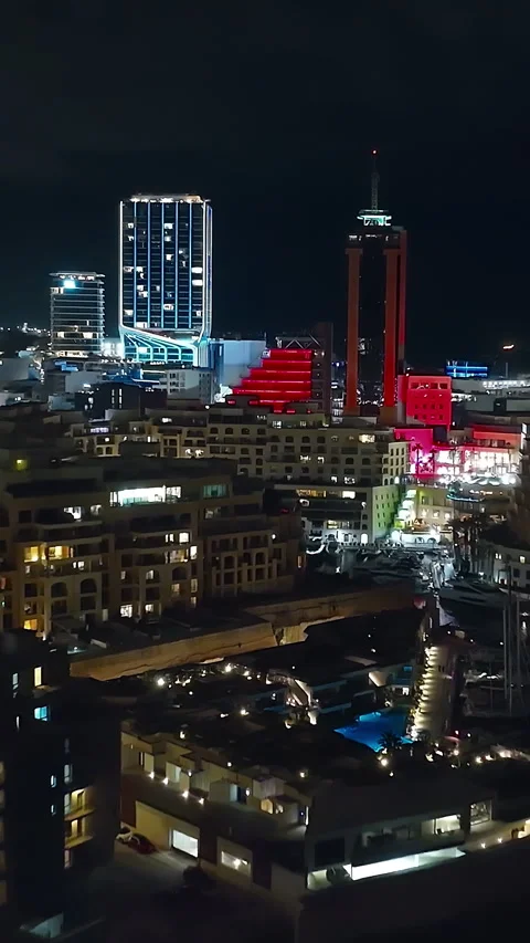 Aerial of night view of Paceville, St. Julian's city with modern towers. Malta 库存影片 343326467