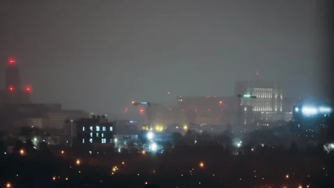 Aerial Night View: Parliament Bucharest Shrouded in Winter Fog Video stock 337184341